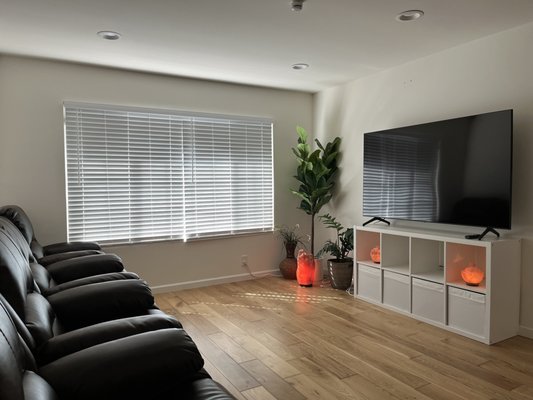 Living room with seating and television at The Rose Garden Elderly Care